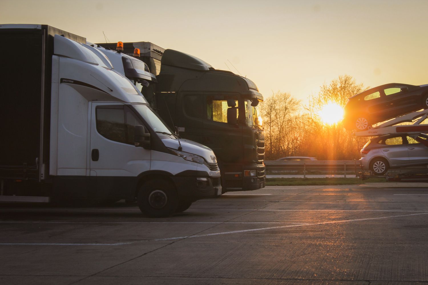 Commercial fleet vehicles lined up at the yard