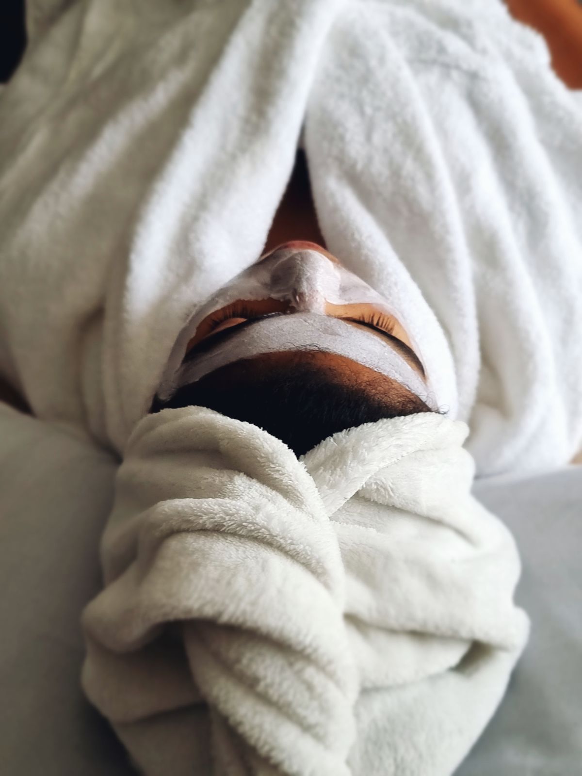 A relaxed guest during a calming facial