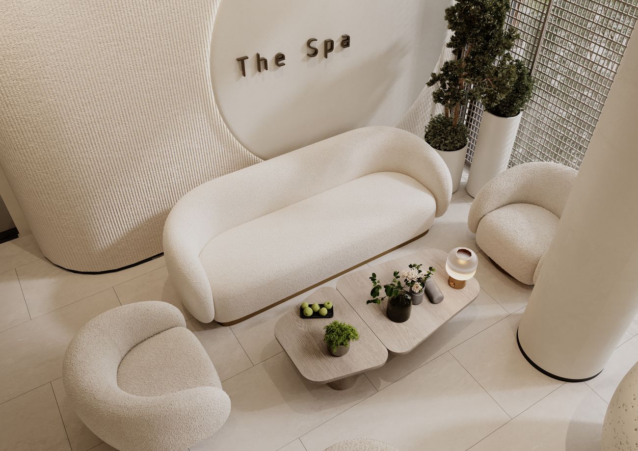 The calm, neutral reception lounge at the studio