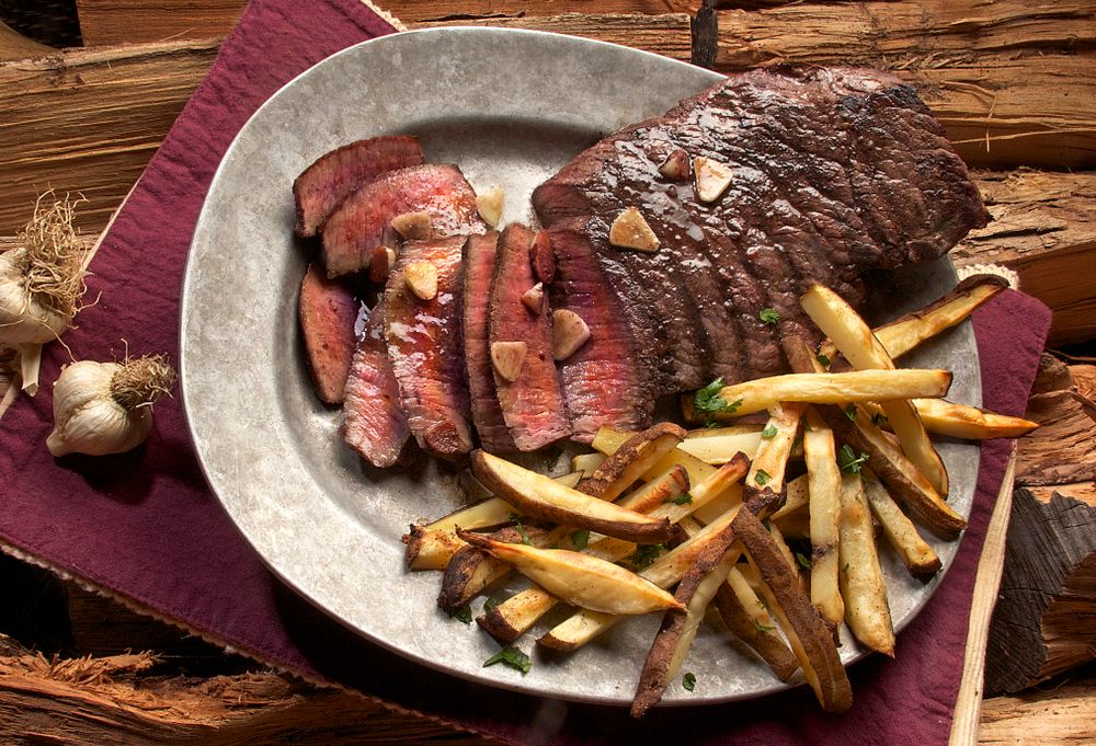 Sliced smoked brisket on a plate.