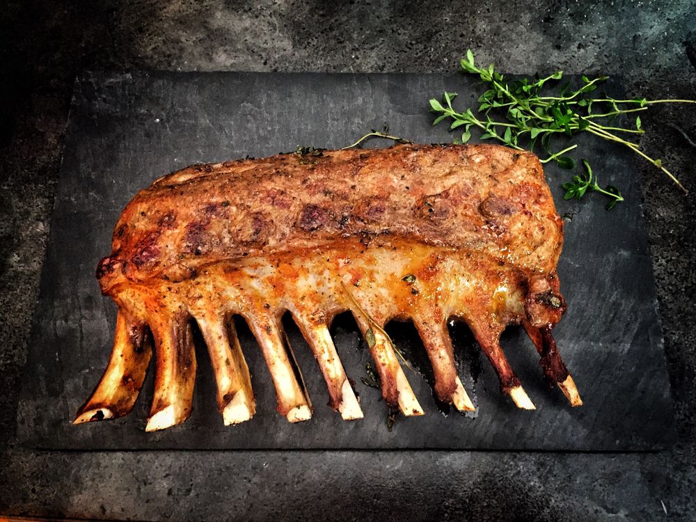 A dry-rubbed rack of pork ribs fresh off the smoker.